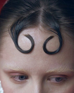 Abstract close-up of curled hair details.