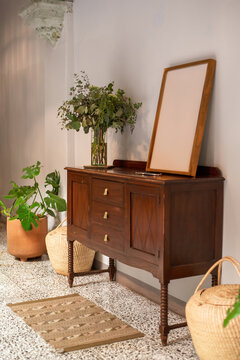 Elegant Wooden Furniture in a Cozy Indoor Setting With Plants