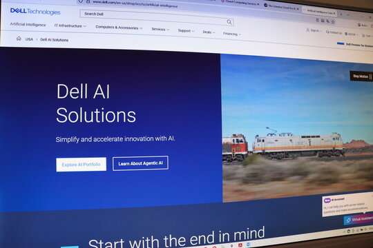 Computer monitor showing Dell AI Solutions website with text and train image. AI innovation concept for technology.