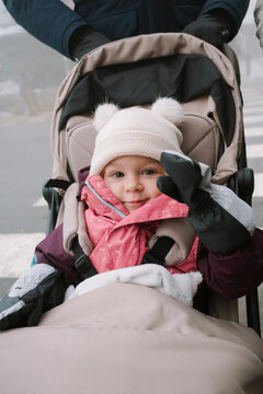 Toddler in stroller with winter clothes