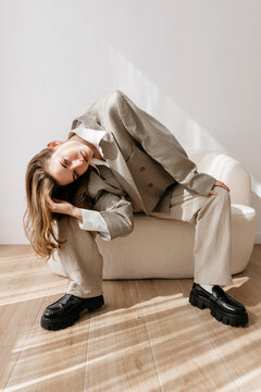 Fashionable model bending over