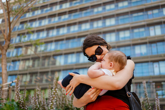 A mother with her son in the city