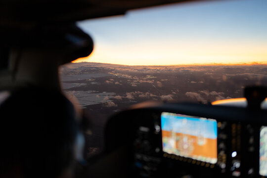 Scenic Aerial View from Cockpit at Sunset