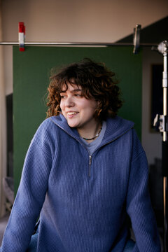 Young woman on a studio photoshoot
