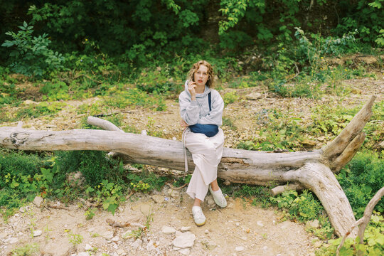 Portrait of young woman  relaxing on the nature