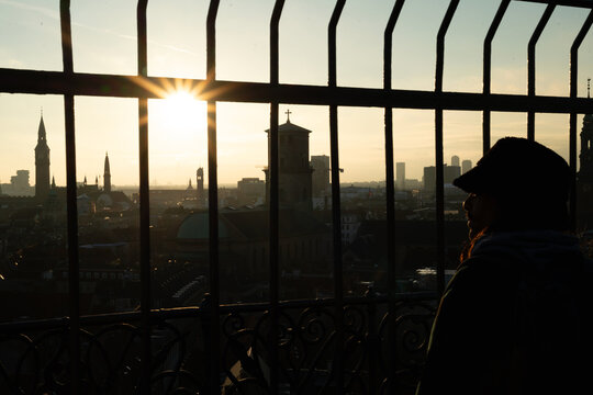 Young man on a watchtower in Kopenhagen 