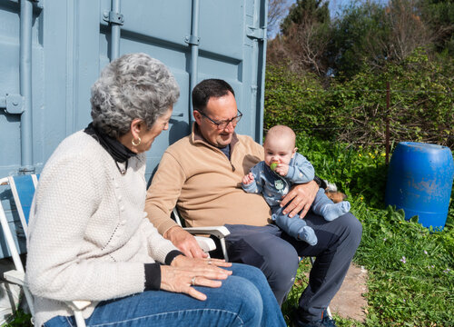Grandparents enjoying time with their grandchild