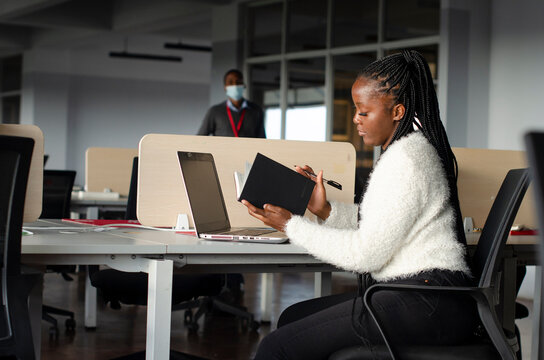 Young Lady checks her diary 