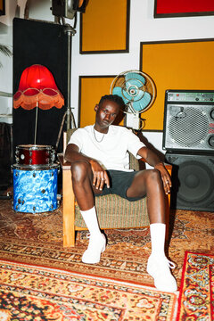 Portrait Stylish Man in Retro Music Space