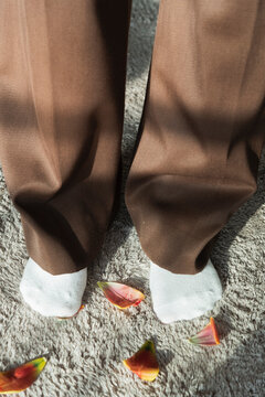 Brown Pants, White Socks & Petals


