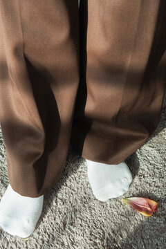 Brown Pants, White Socks & Petals

