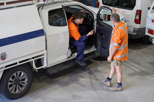 Apprentice being introduced to service  vehicle