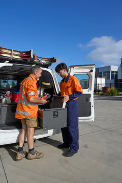 Apprentice learning equipment procedure at job site 