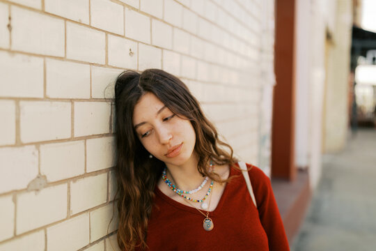 Portrait of young brunette woman outdoors