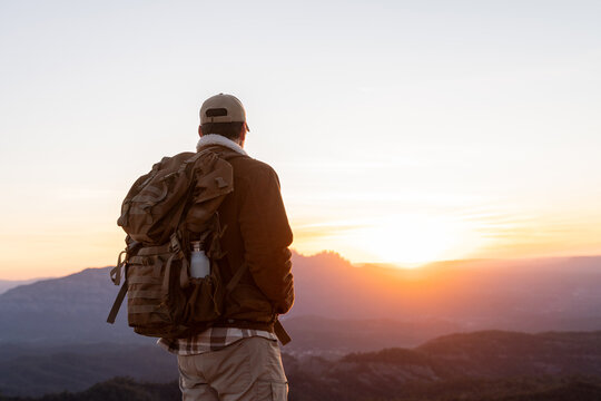 Man hiking at sunset