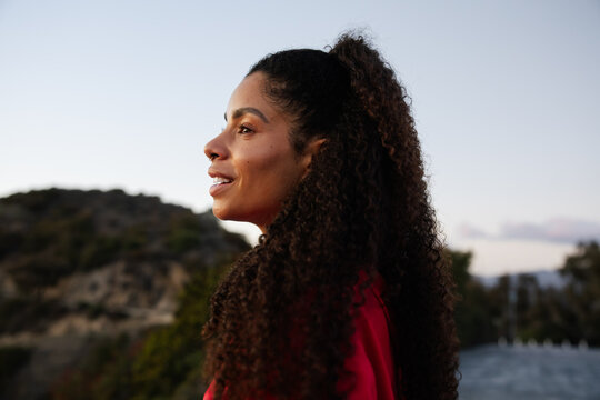 Portrait of a Woman Looking Hopeful Outdoors