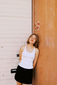 Happy young woman on the street