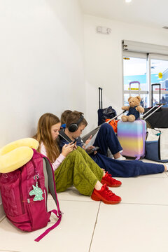 Family Airport Travel waiting for flight in terminal
