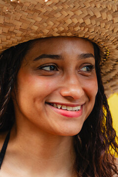 Smiling portrait with straw hat