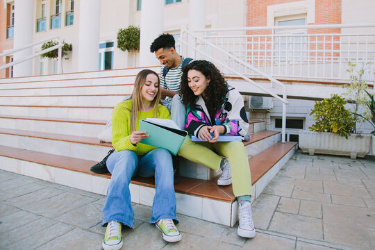 Group of students reviewing notes