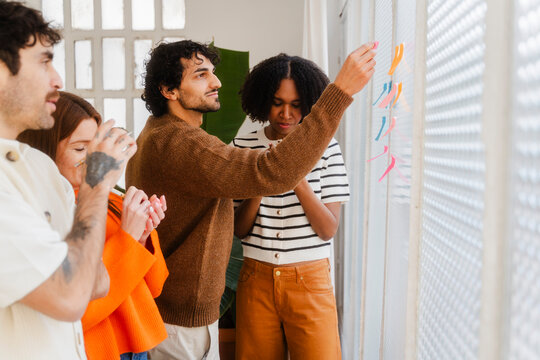 Businesspeople Working Together In Modern Office