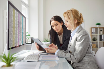 Young business people company employees having discussion about financial data analyzing company...