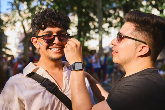 Couple celebrating at pride parade