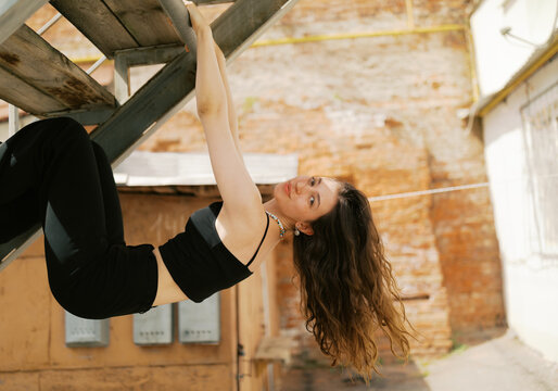 Environmental Portrait of young brunette woman