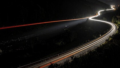 Abstract light trails on a black background