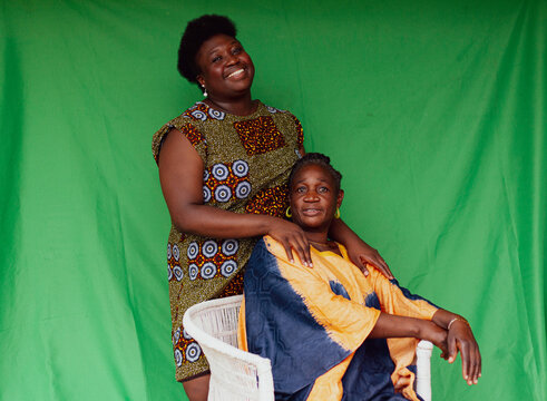 One woman holding another's shoulders