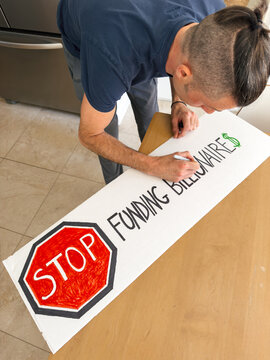 Man Making Protest Sign