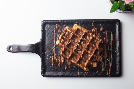 Waffle with Nutella chocolate sauce