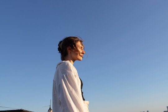 A woman walks on the roof