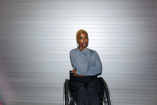 Confident Woman in a Wheelchair Wearing a Stylish Outfit