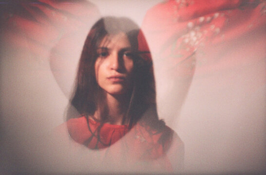 Portrait Of A Girl With Double Exposure