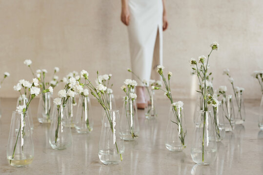 White flowers arranged in vases 