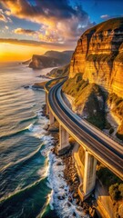 Fototapeta premium A dramatic sea cliff bridge stands majestically at sunset