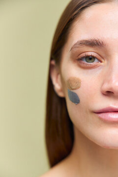 A woman's face with cosmetic stains