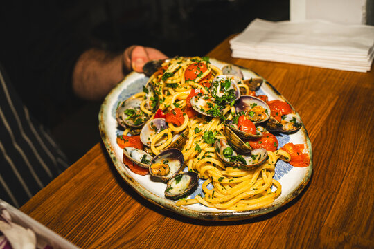 Seafood Dish being placed onto pass