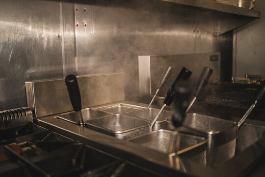 Empty Deep Fryers in Kitchen