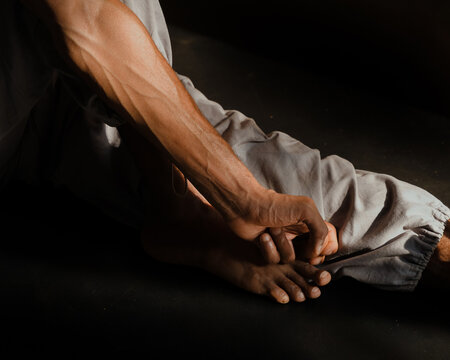 Detailed Close-up of a men's Hand and Foot in Motion