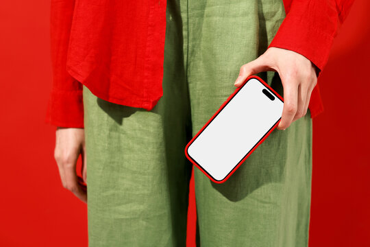 Hand Holding Phone with Blank Screen