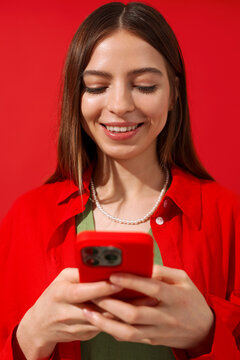 Woman Holding Red Mobile Phone