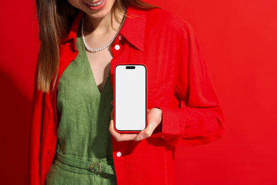 Mockup phone with white screen. Woman in Red Outfit