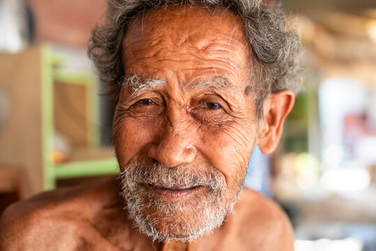 Elderly Man in Thai Low-Income Community