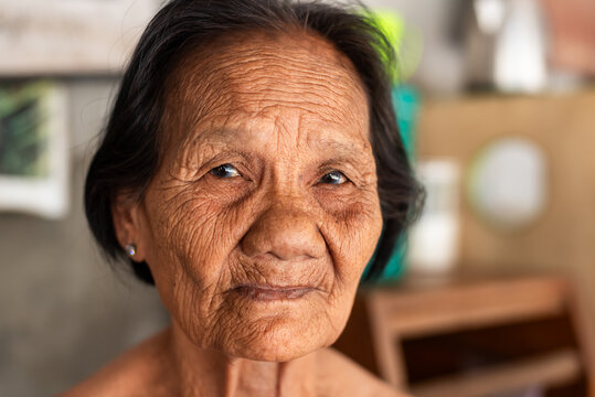 Elderly Woman in Thai Low-Income Community