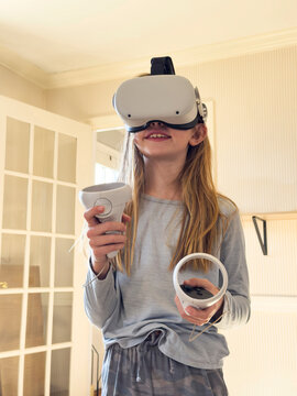 Portrait of Young Girl smile  with Virtual Reality Goggles 