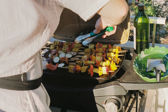 Grilling Delicious vegan vegetable skewers on Barbecue