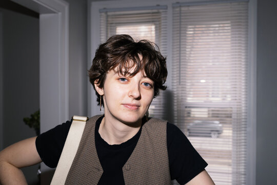 LGBT woman looking into camera for candid portrait