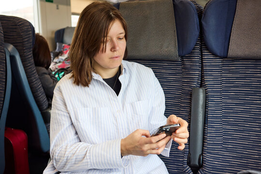 Young woman on a train 